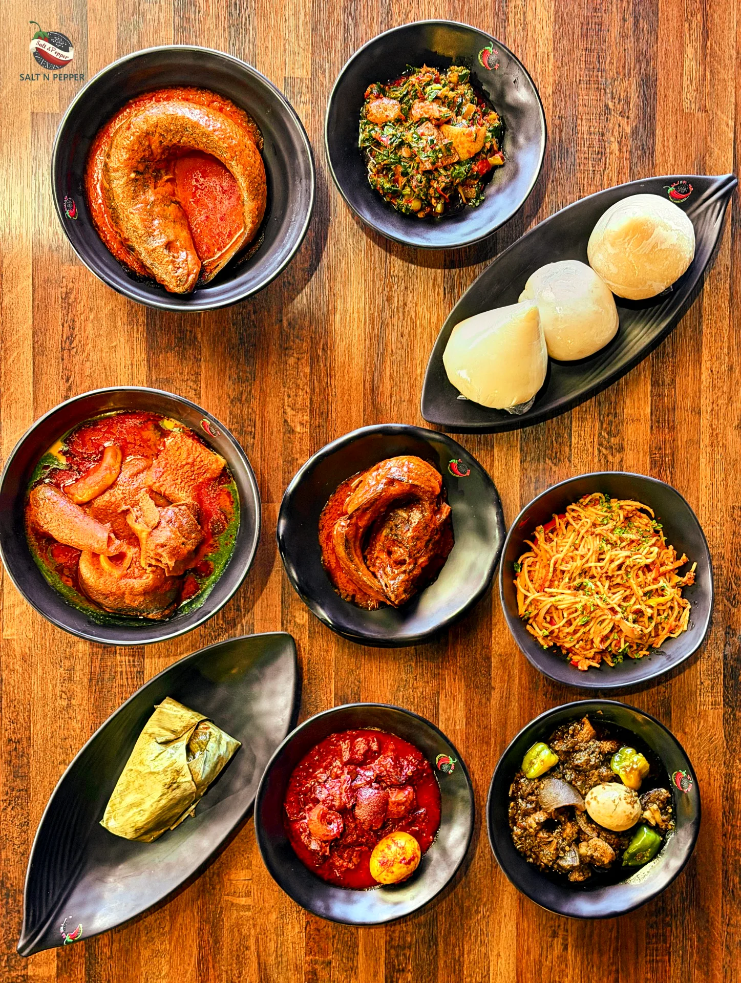 Swallows, stews and jollof rice on the table